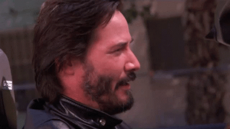 Keanu Reeves Winking GIF