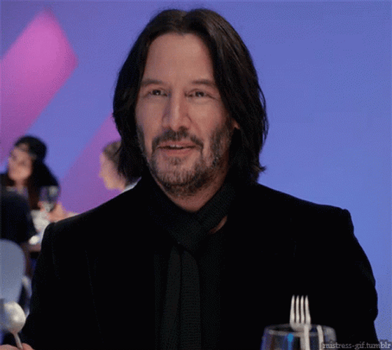 Keanu Reeves With Fork And Spoon GIF