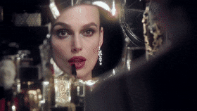 Keira Knightley Putting Chanel Lipstick GIF