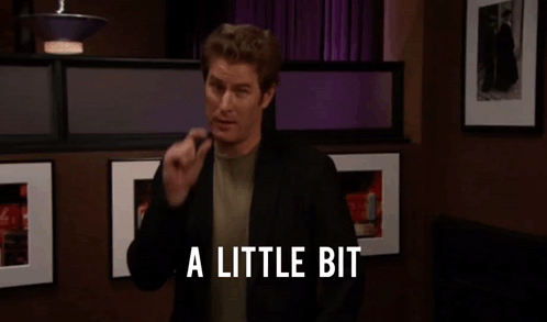 Kellie Rudd Missed It By That Much Sign GIF