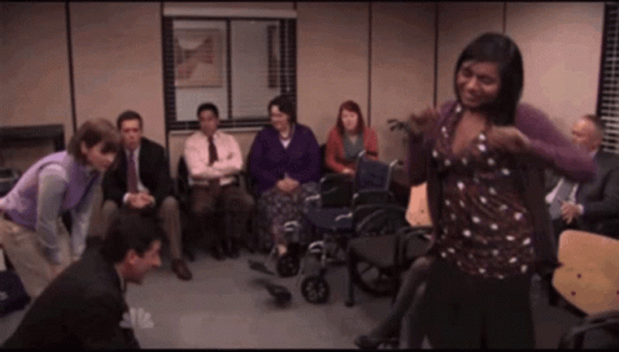 Kelly Kapoor Dancing While Co Worker Giving Cpr GIF
