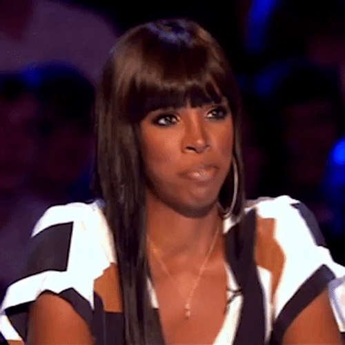 Kelly Rowland Trying Not To Laugh GIF