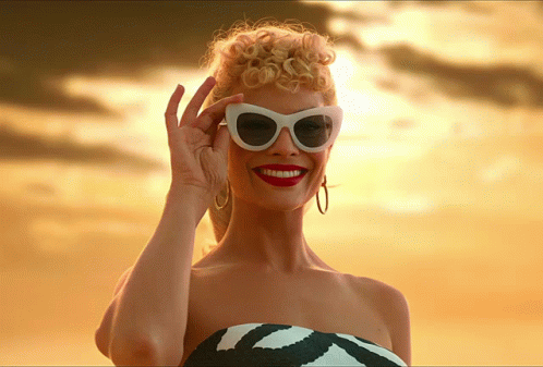 Ken Beach Barbie Winks GIF