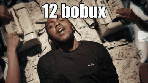 Kendrick Lamar Lying On Millions Of Cash GIF