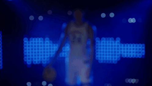 Kentucky Basketball Player in Front of Blue Background
