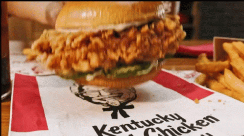 Kentucky Chicken Sandwich Served On Paper GIF