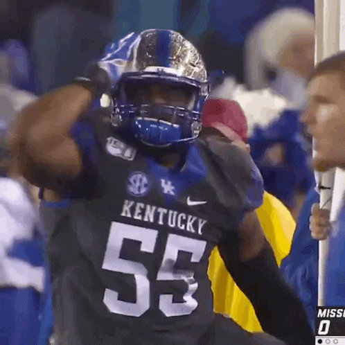 Kentucky Football Player Wearing Helmet And Gloves GIF
