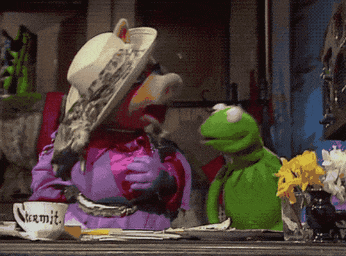 Kermit and Miss Piggy at Table