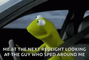 Kermit The Frog Is Driving A Car And Talking About The Next Red Light Looking At The Guy Who Sped Around Me . GIF