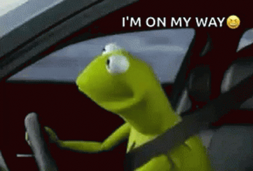 Kermit The Frog Is Driving A Car With The Words I 'M On My Way Above Him GIF
