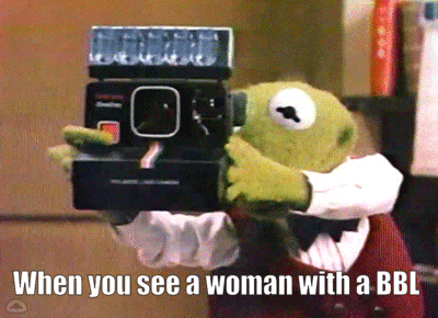 Kermit The Frog Is Holding A Polaroid Camera With The Caption " When You See A Woman With A Bbl " GIF