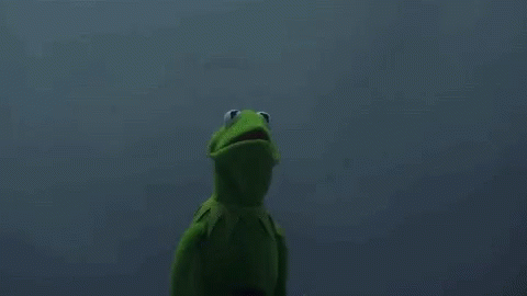 Kermit The Frog Is Standing Next To A Grim Reaper In A Black Hood . GIF
