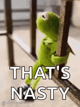 Kermit the Frog Sitting on Railing