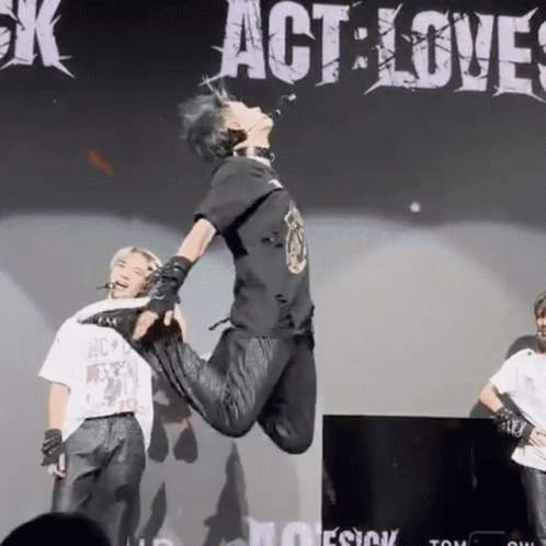 Kevin Gates Jumped Holding Feet GIF
