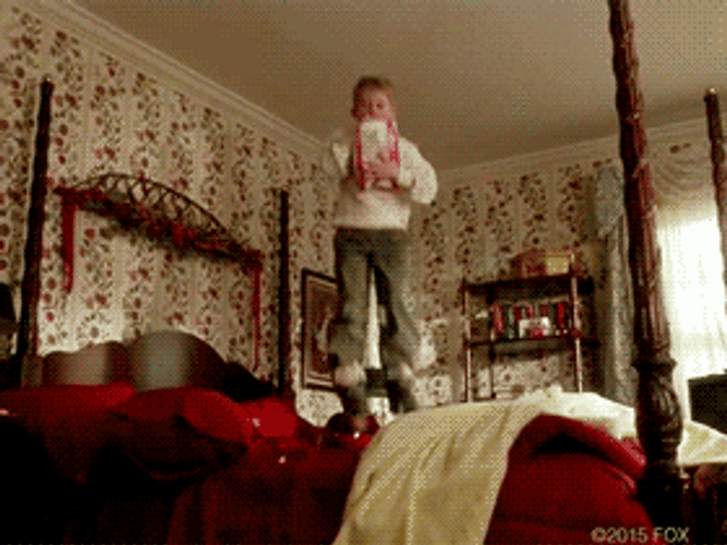 Kevin Home Alone Jumping On The Bed GIF