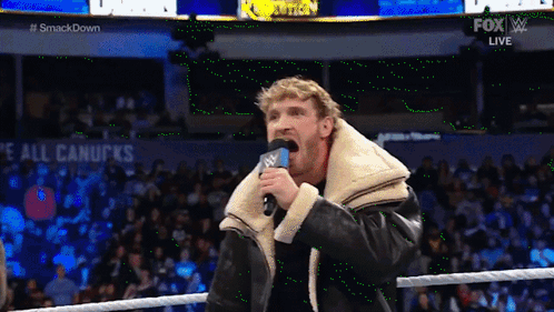 Kevin Owens Punch Logan Paul Wwe GIF