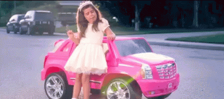 Kid Dancing Beside Toy Jeep GIF
