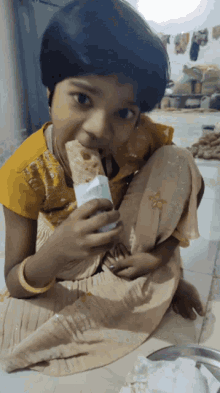 Kid Eating Egg Roll GIF