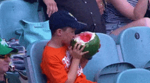 Kid Eating Whole Watermelon GIF