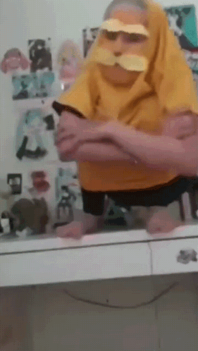 Kid Mimicking Dr. Seuss' The Lorax Or Onceler GIF