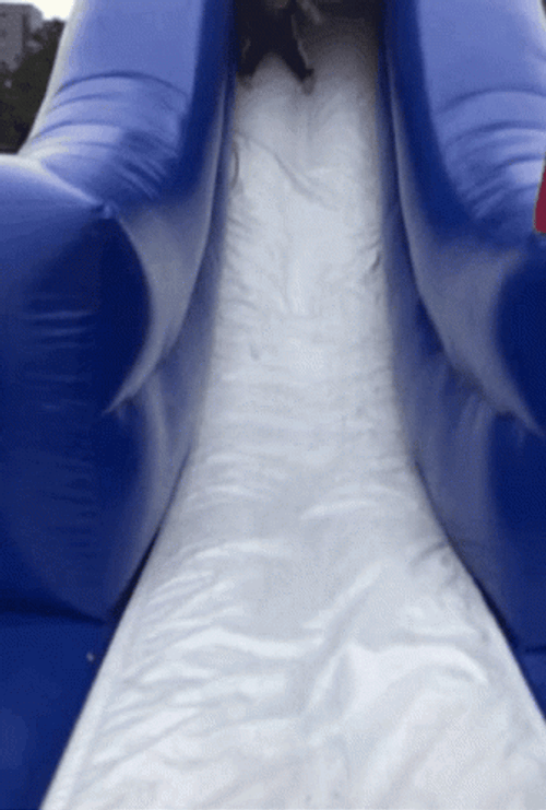 Kid On Bouncy Slide Fails GIF