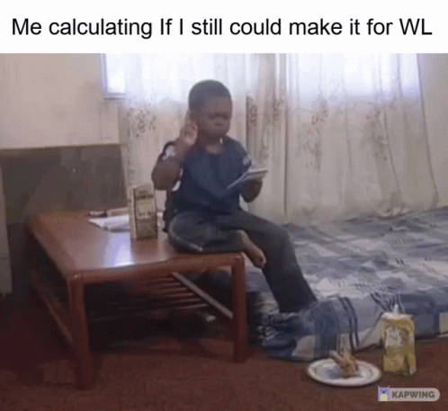Kid on Table with Milk Box and Food