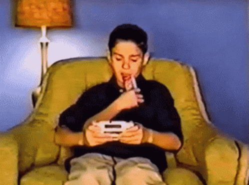 Kid Playing Game Boy GIF