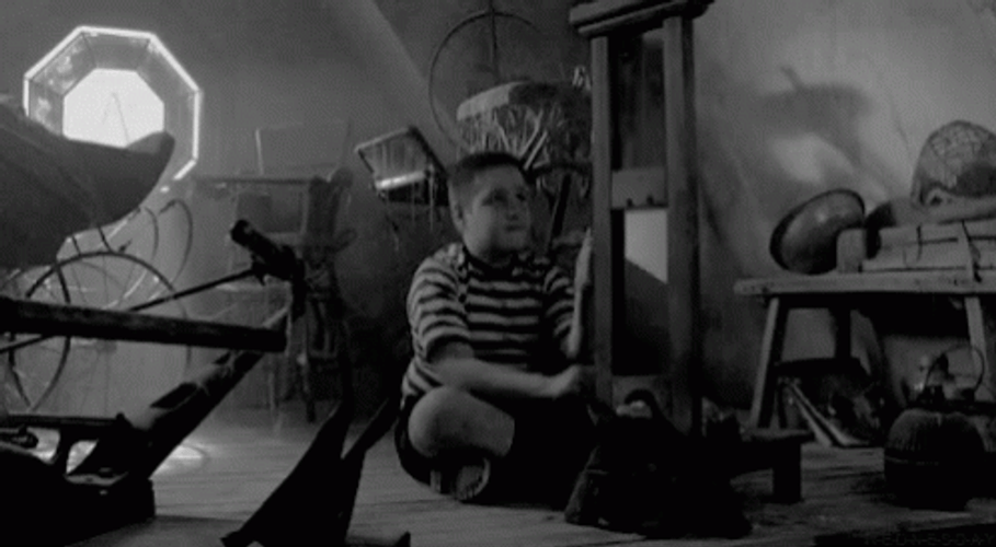 Kid Playing With A Guillotine  GIF