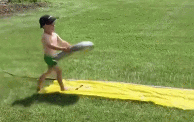 Kid Slipping On A Mini Pool GIF