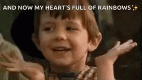Kid With Melted Hearts Of Rainbow GIF