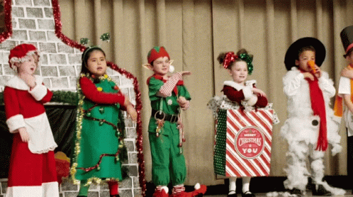 Kids Dressed As Elf Santa GIF