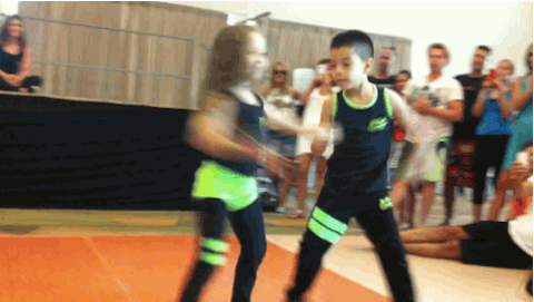 Kids Energetically Performing Salsa GIF