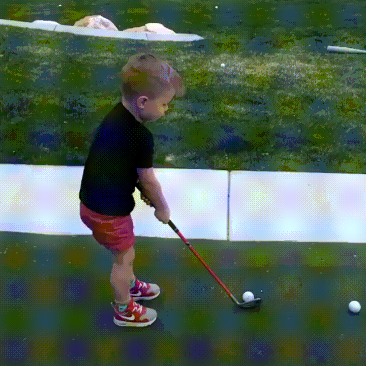 Kids Falling During Big Swing Golf GIF