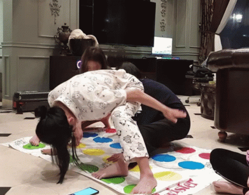 Kids Having Fun Playing Twister Game GIF