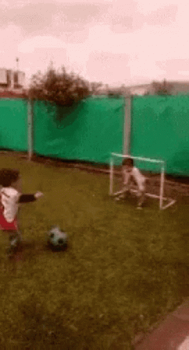 Kids Playing Football Goal GIF