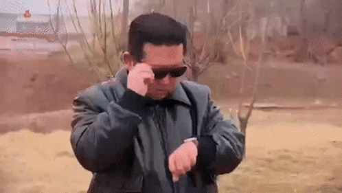 Kim Jong-un Black Glasses Take Off Check Watch GIF