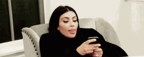 Kim Kardashian Ignoring Phone Chat GIF