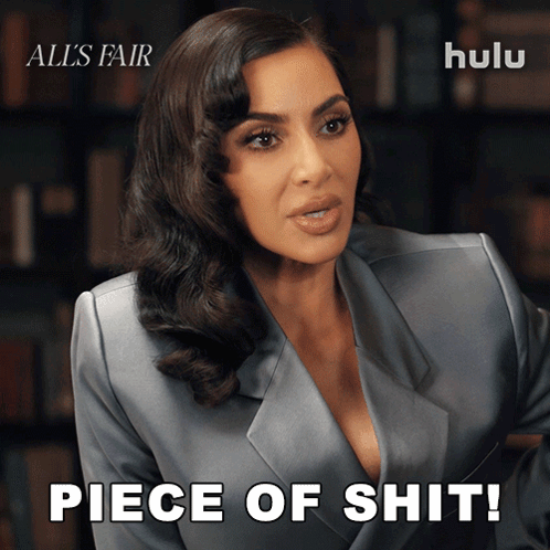 Kim Kardashian Says Piece of Shit in Suit