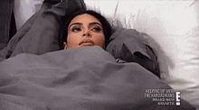 Kim Kardashian Thinking In Bed At Home GIF