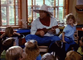 Kindergarten Cop Detective John Kimble Singing Song GIF