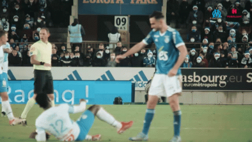 Kindness Football Player Helping His Opponent GIF