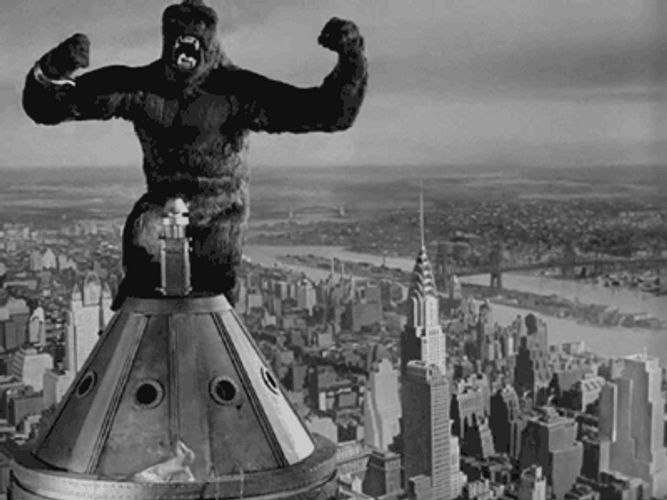 King Kong Beating His Chest On Top Of Building GIF