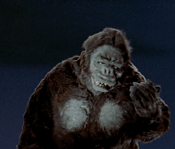 King Kong Dazzled By Spotlight In Old Movie GIF