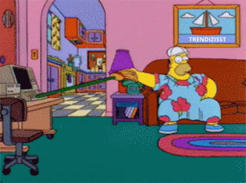 King-size Homer Working And Watching GIF
