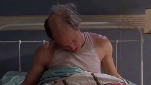 Kingpin Woody Harrelson Waking Up GIF