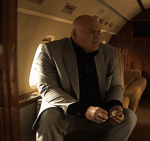Kingpin Getting Out His Seat GIF