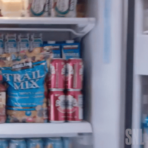 Kirkland Trail Mix Bag on Refrigerator Shelf With Soda Cans