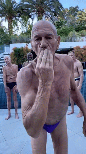Old Man In Speedo Blowing Kisses GIF