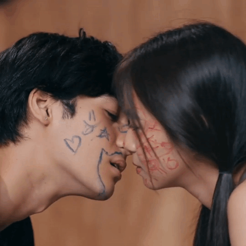 Kissing Man And Woman With Hearts And Stars GIF