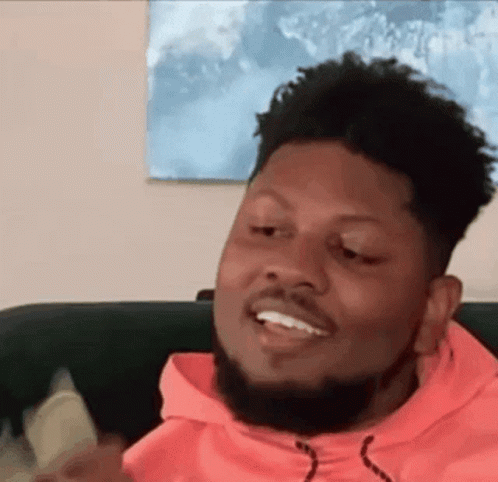 Kissing Twenty Dollar Bill While Seating GIF